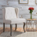 Poltrona d'accento Niclas Wing Back con borchie in tessuto by