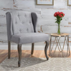 Poltrona d'accento Niclas Wing Back con borchie in tessuto by