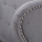 Poltrona d'accento Niclas Wing Back con borchie in tessuto by
