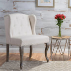Poltrona d'accento Niclas Wing Back con borchie in tessuto by