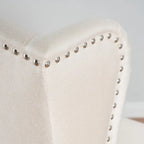 Poltrona d'accento Niclas Wing Back con borchie in tessuto by