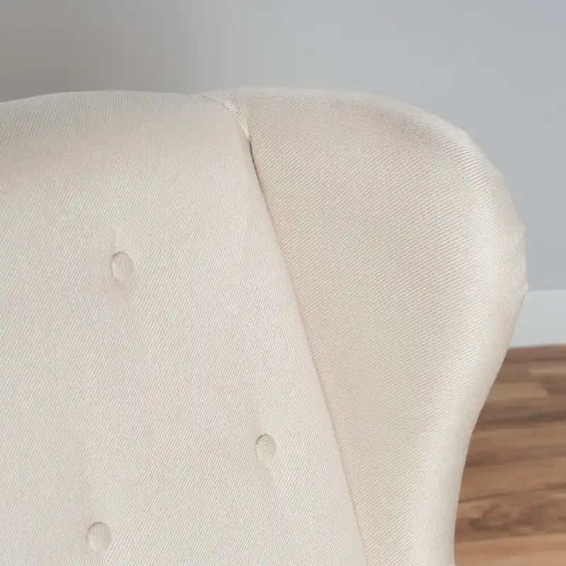 Poltrona d'accento Niclas Wing Back con borchie in tessuto by
