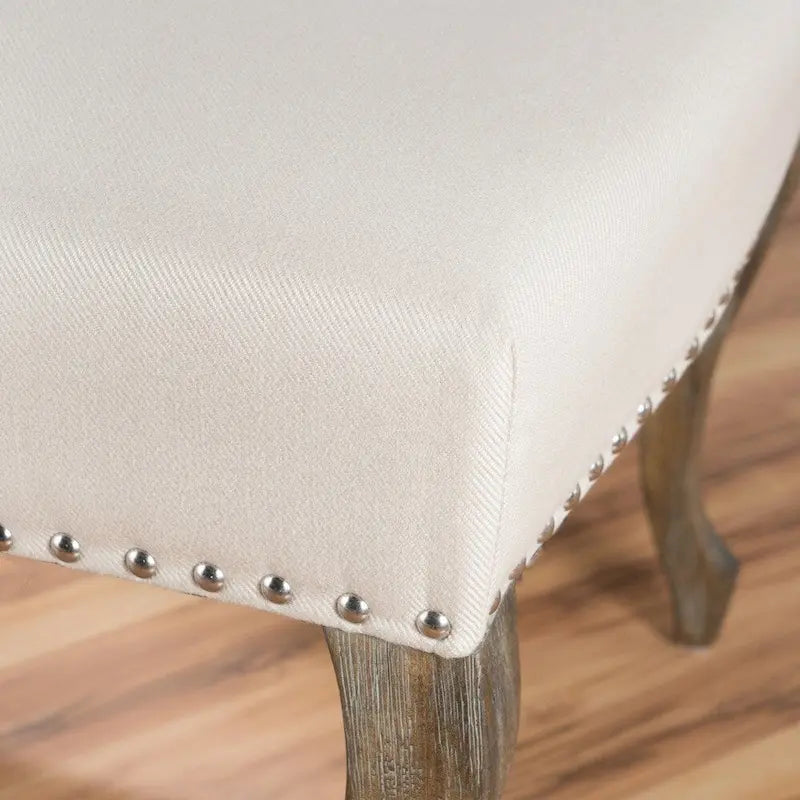 Poltrona d'accento Niclas Wing Back con borchie in tessuto by