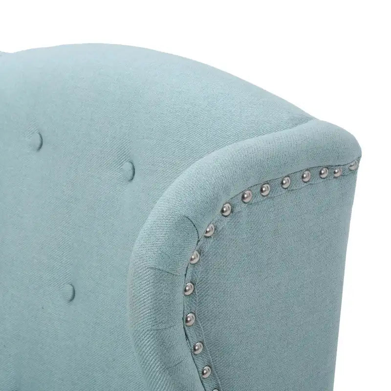 Poltrona d'accento Niclas Wing Back con borchie in tessuto by